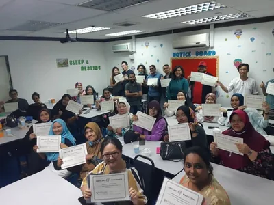 Participants taking part in a classroom-based workshop